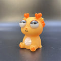 DinoEye Sensorial™  Dinossauro Antiestresse com Olhos Saltantes para Relaxamento e Diversão
